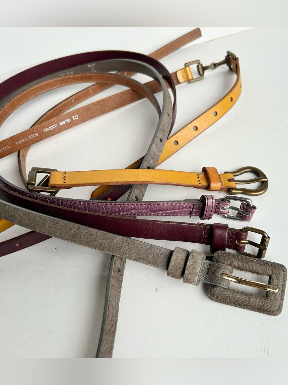 4 belts. Club Monaco, H&M, Uniqlo